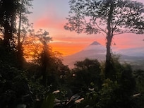 View of Arenal volcano from our room at sunrise.