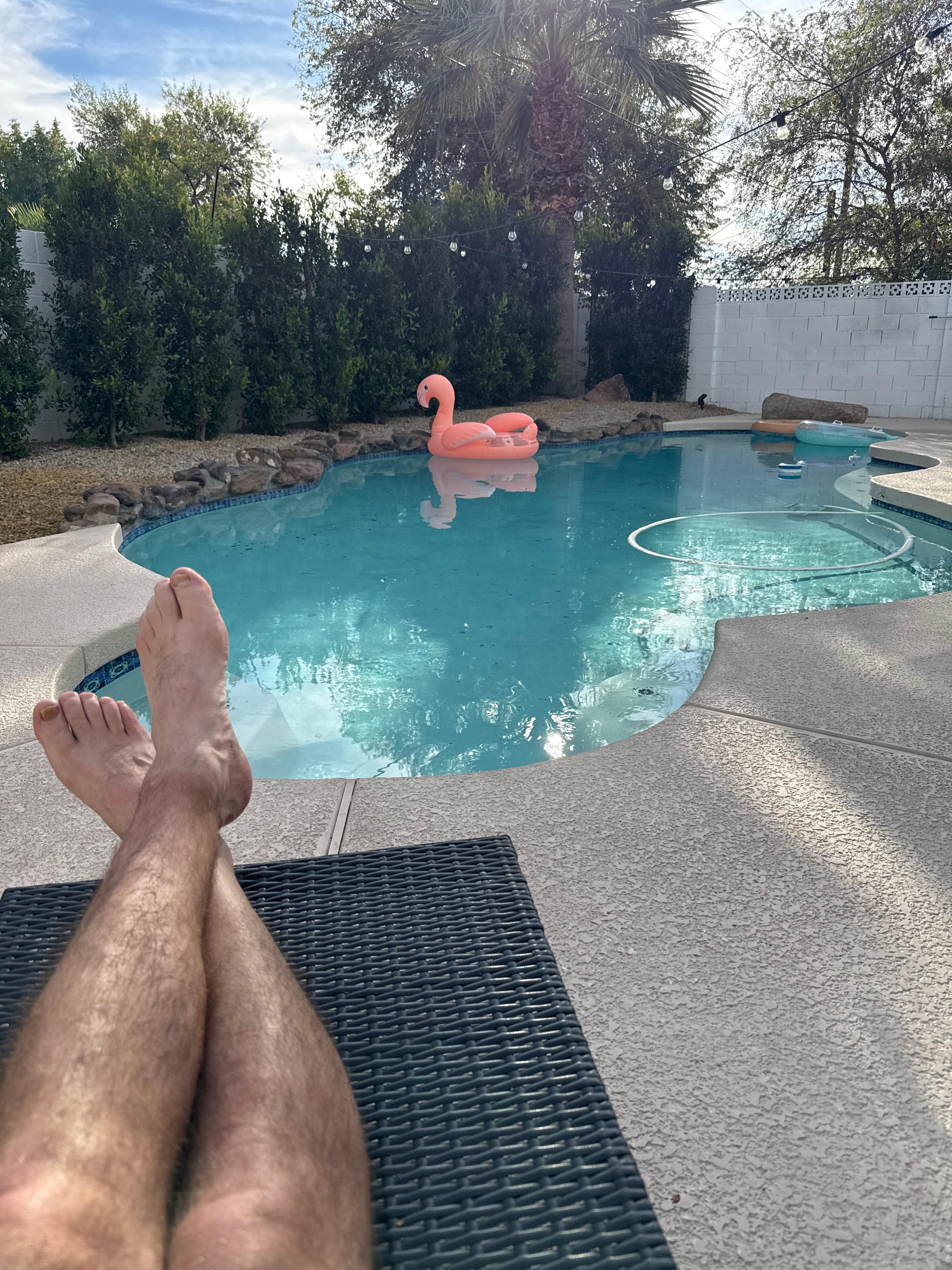 Cooling off by the pool after a round of golf. 