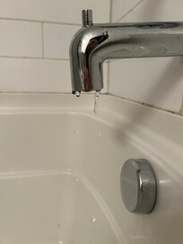 Not dripping but continuously running in downstairs bath