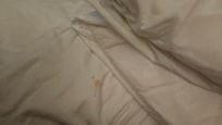 The bed sheet had a stain before I could use it.