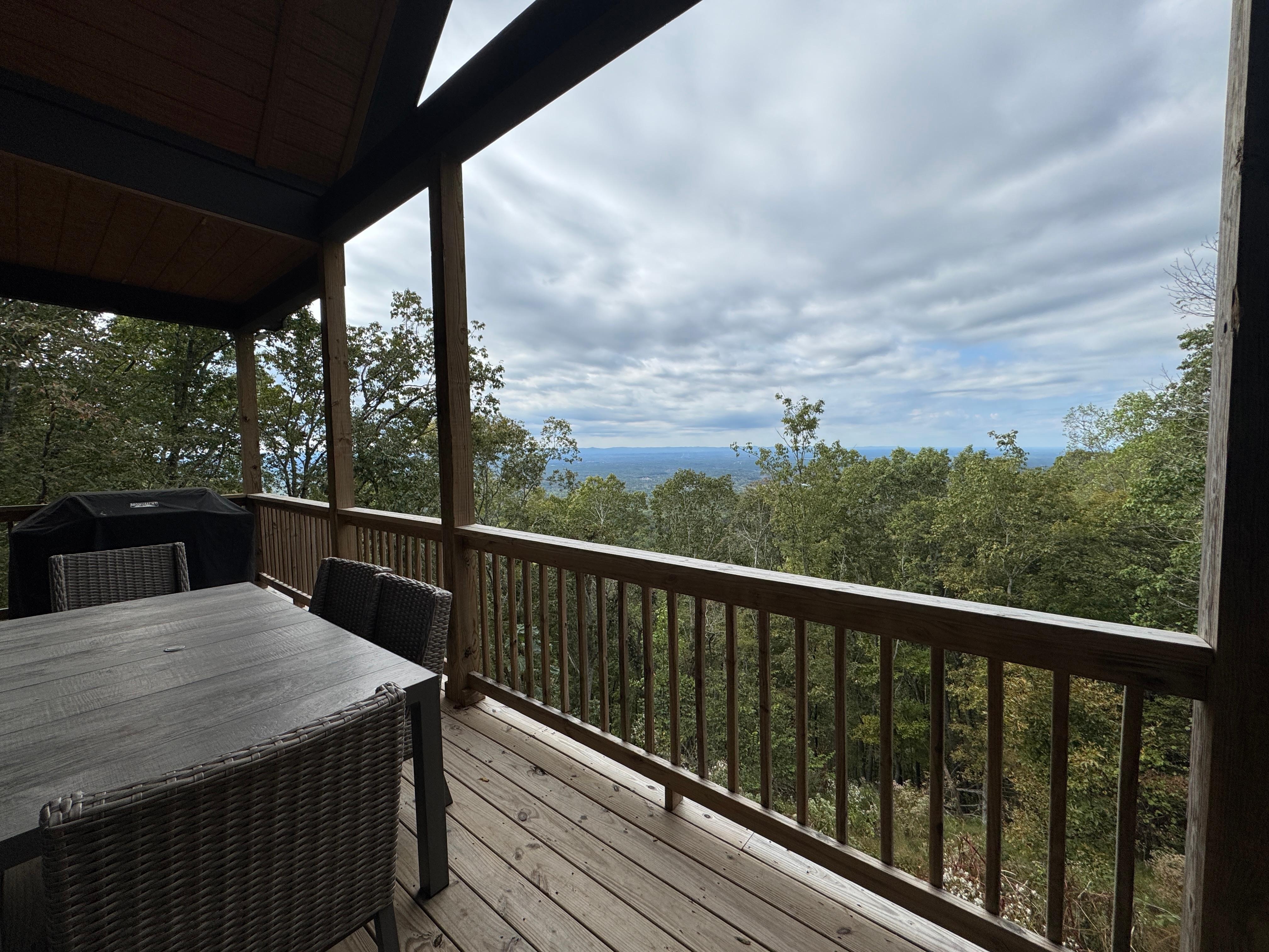 Great deck with lots of seating and fireplace!
