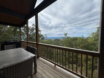 Great deck with lots of seating and fireplace!