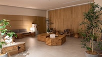 Lobby with self check in and front desk to assist