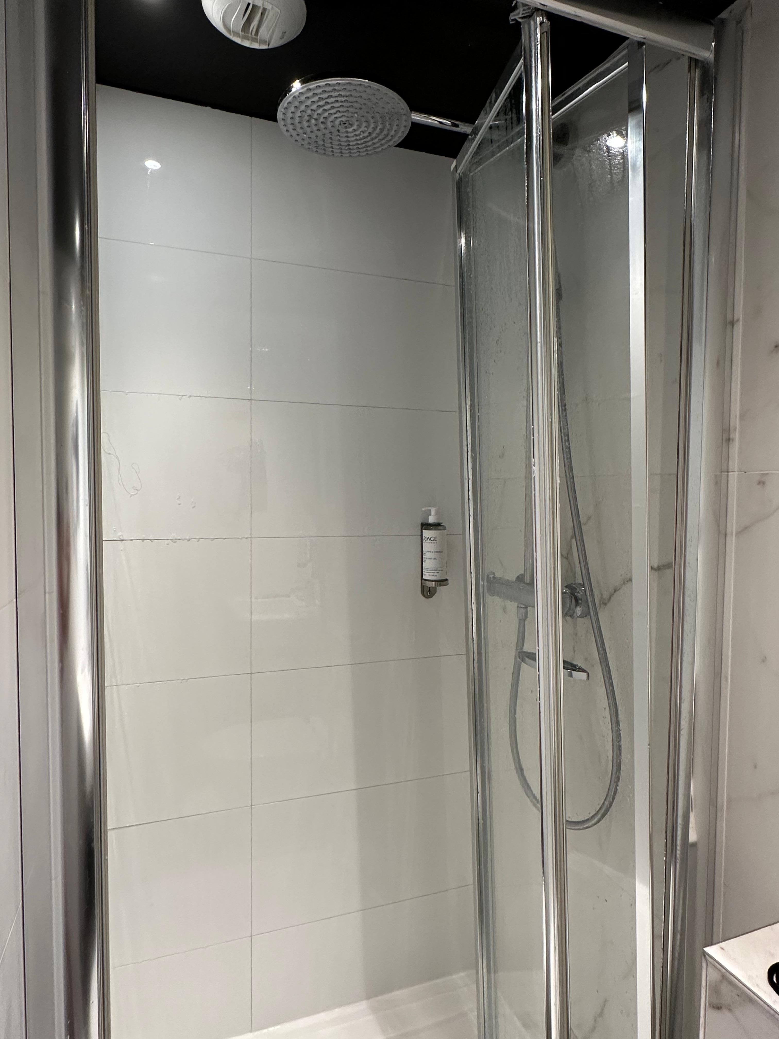 Shower is about a foot off the ground. Not a good fit if you have any sort of mobility issues