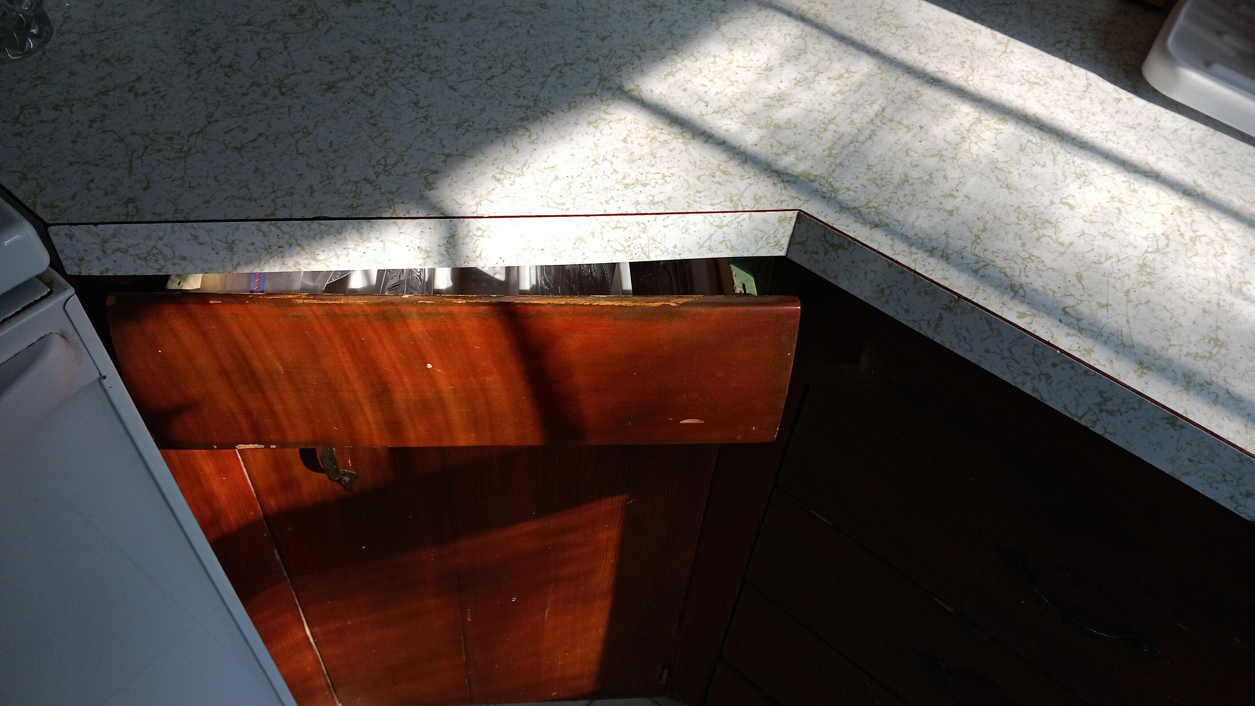 Kitchen drawer...need to move the stove to open it. 