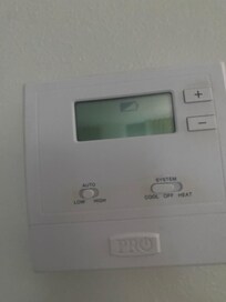 Low battery on thermostats in room