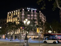 The hotel at night.