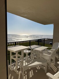 View of balcony and ocean from master bedroom.