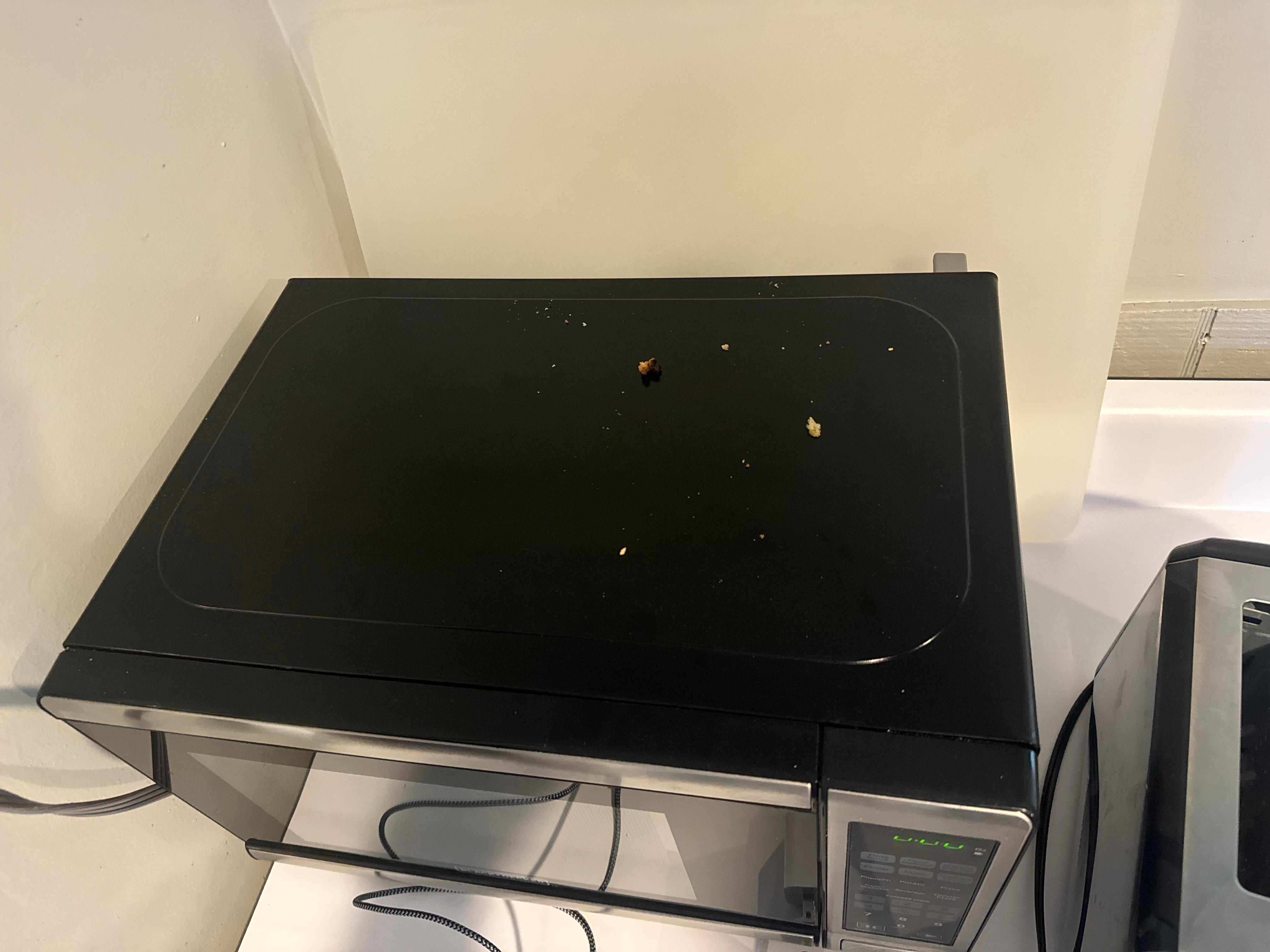 Crumbs on microwave 