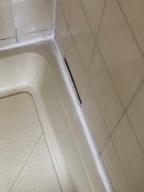 Tiles falling off wall