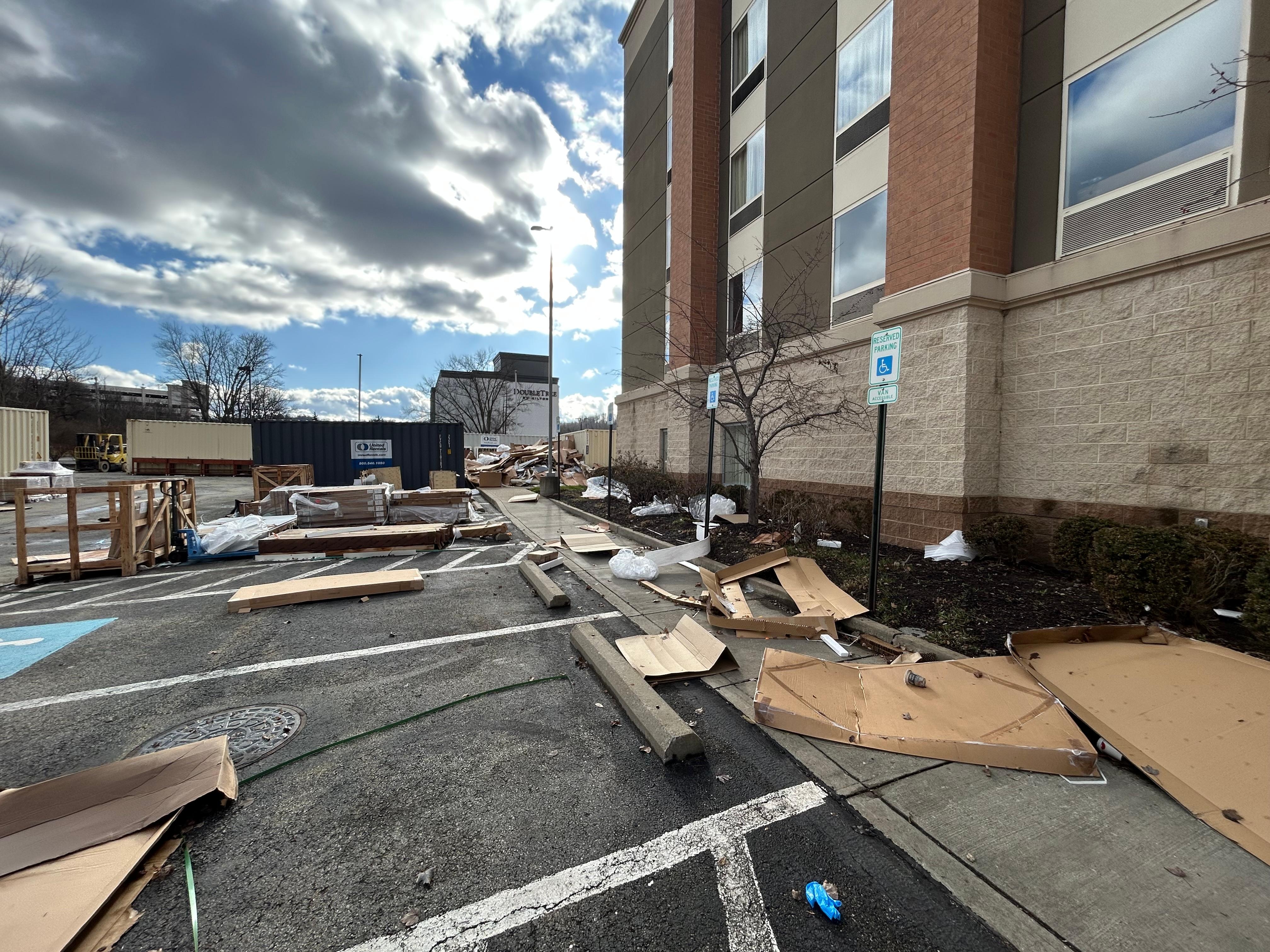 Construction directly outside of our suite and the condition of the parking lot. 