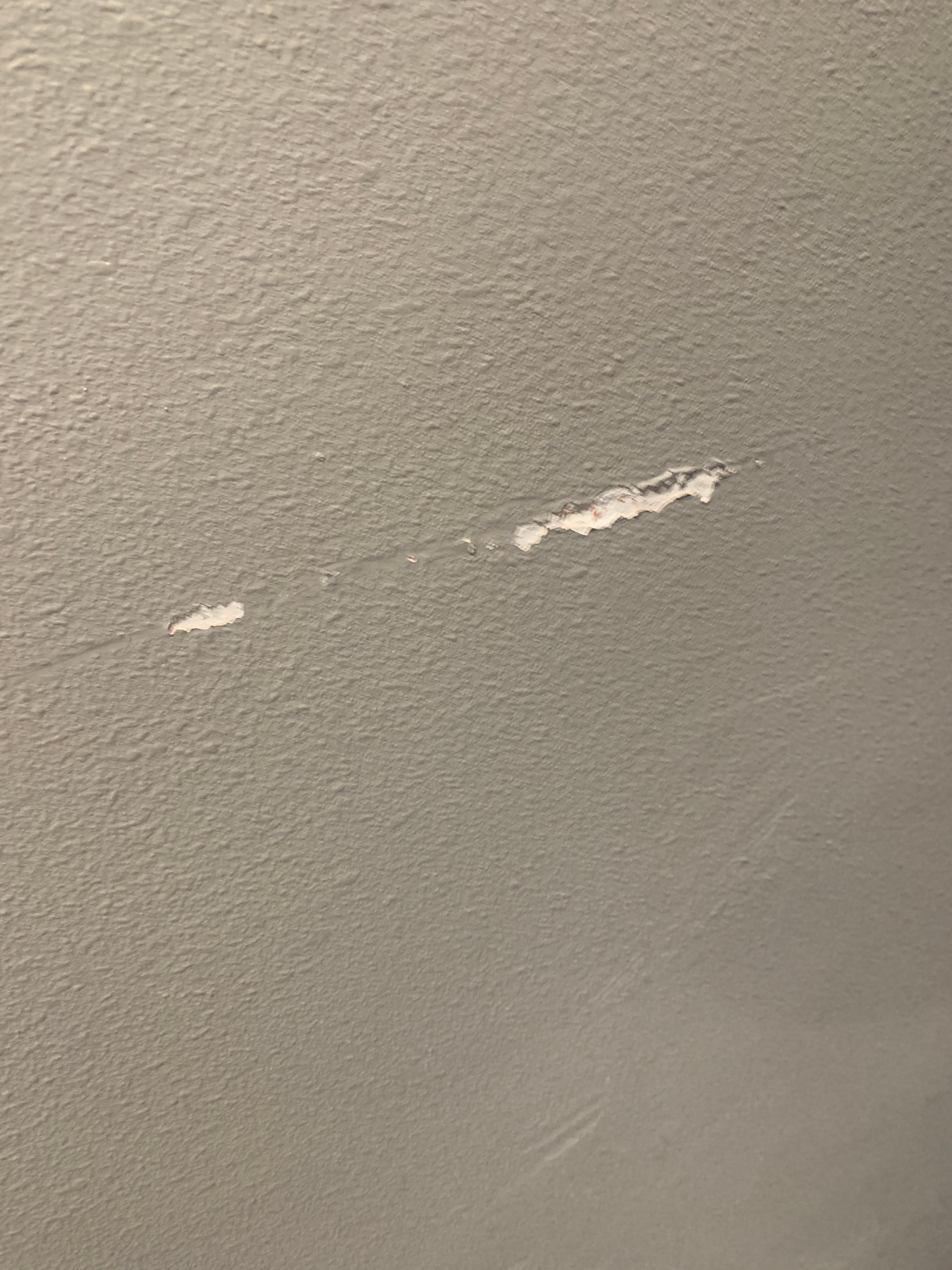 A random mark on the closet wall