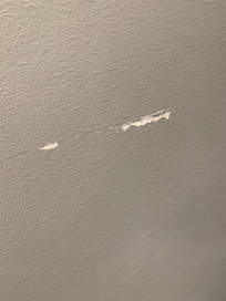 A random mark on the closet wall
