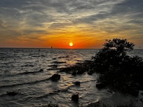 Sunset at Alfred McKethan Park, a short walk down the road.