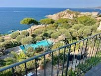 View of the gardens and sea from bedroom balcony