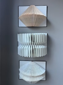 Unique art in primary bedroom