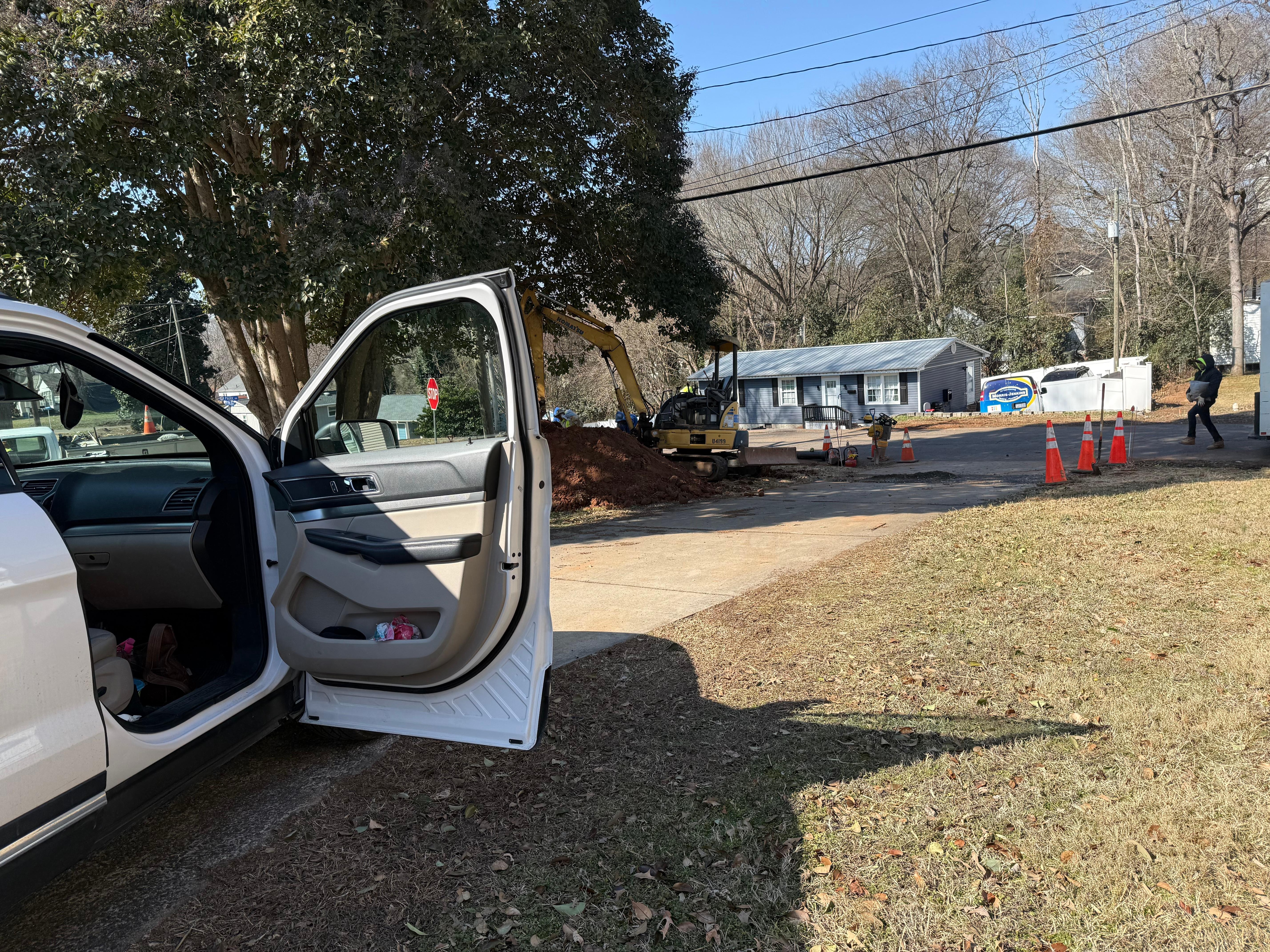 This points to end of driveway where we had to wait to leave and got a flat ftom stray metal. 