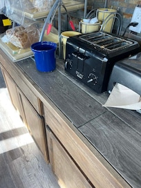 Dirty Breakfast area, no table like pictures and no milk for cereal