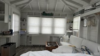 This is the view from the bed (itself equipped with underbed storage) looking towards the bay. The ‘table’ is folded down below the windows in this image.