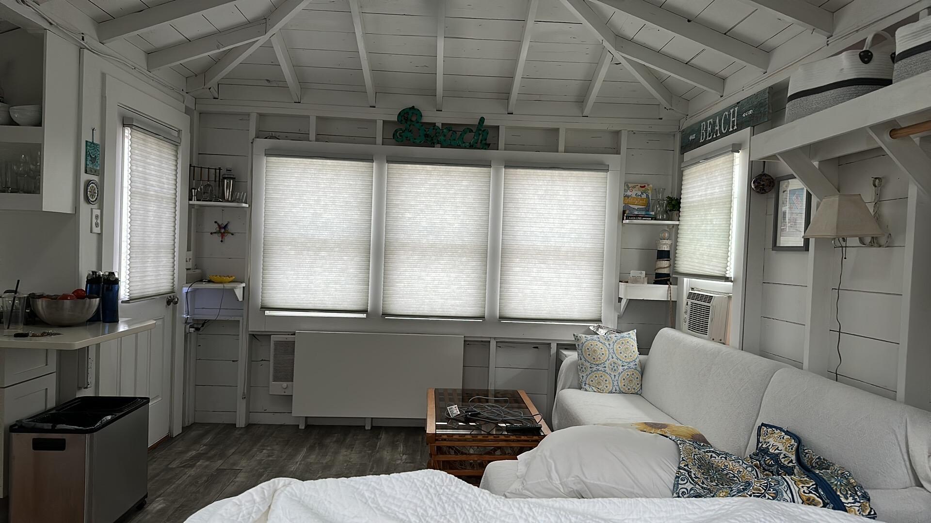 This is the view from the bed (itself equipped with underbed storage) looking towards the bay. The ‘table’ is folded down below the windows in this image.