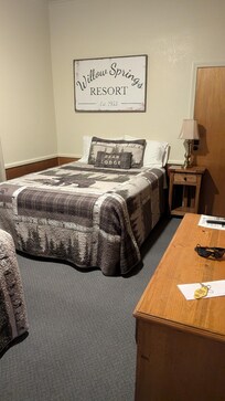 Our cozy room with 2 queen beds and a kitchenette