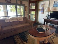 The living room looking out at lake