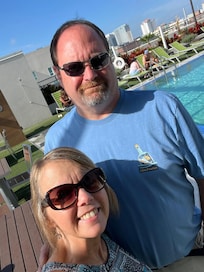 Me and hubby enjoying the morning pool side