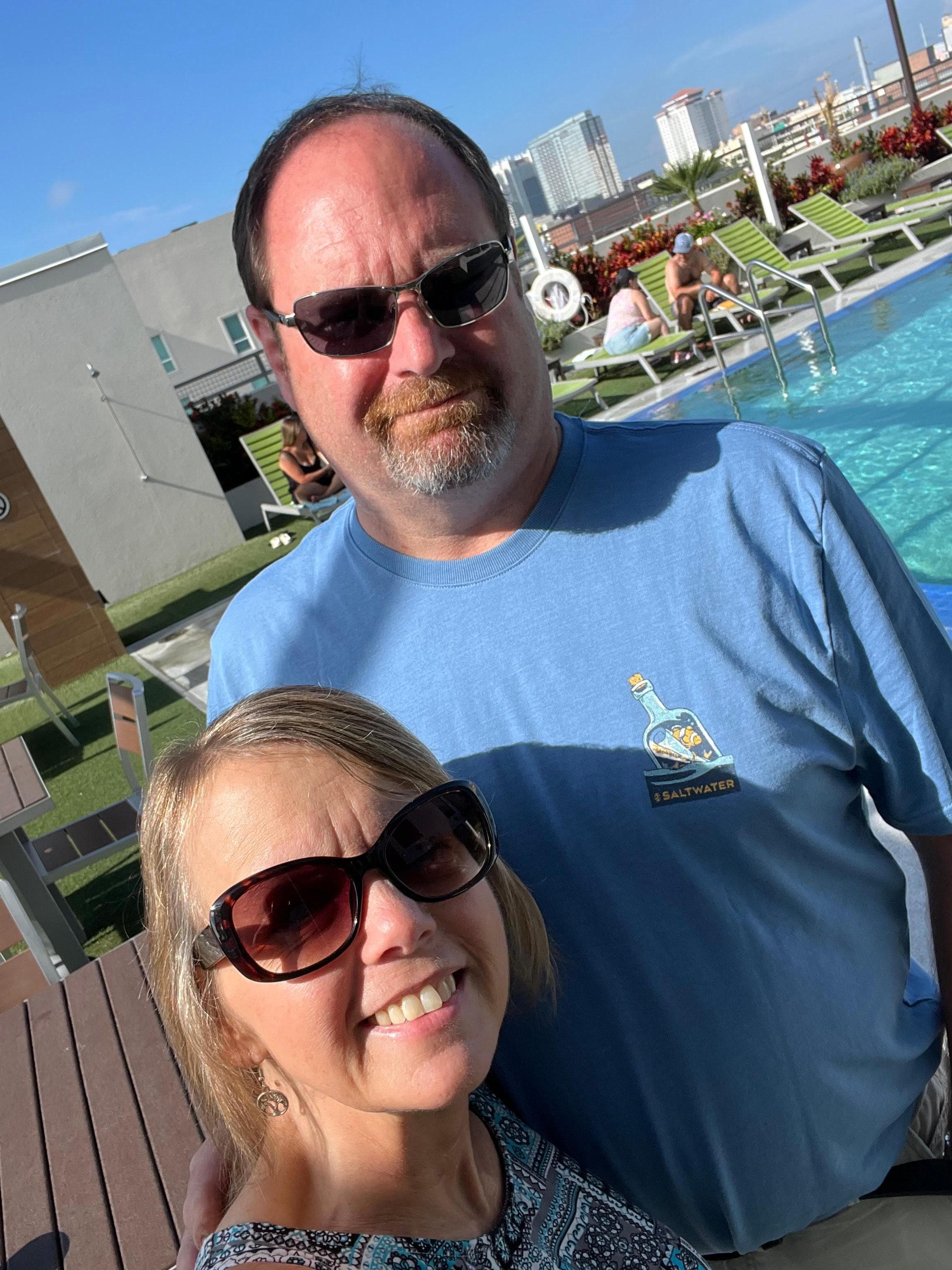 Me and hubby enjoying the morning pool side