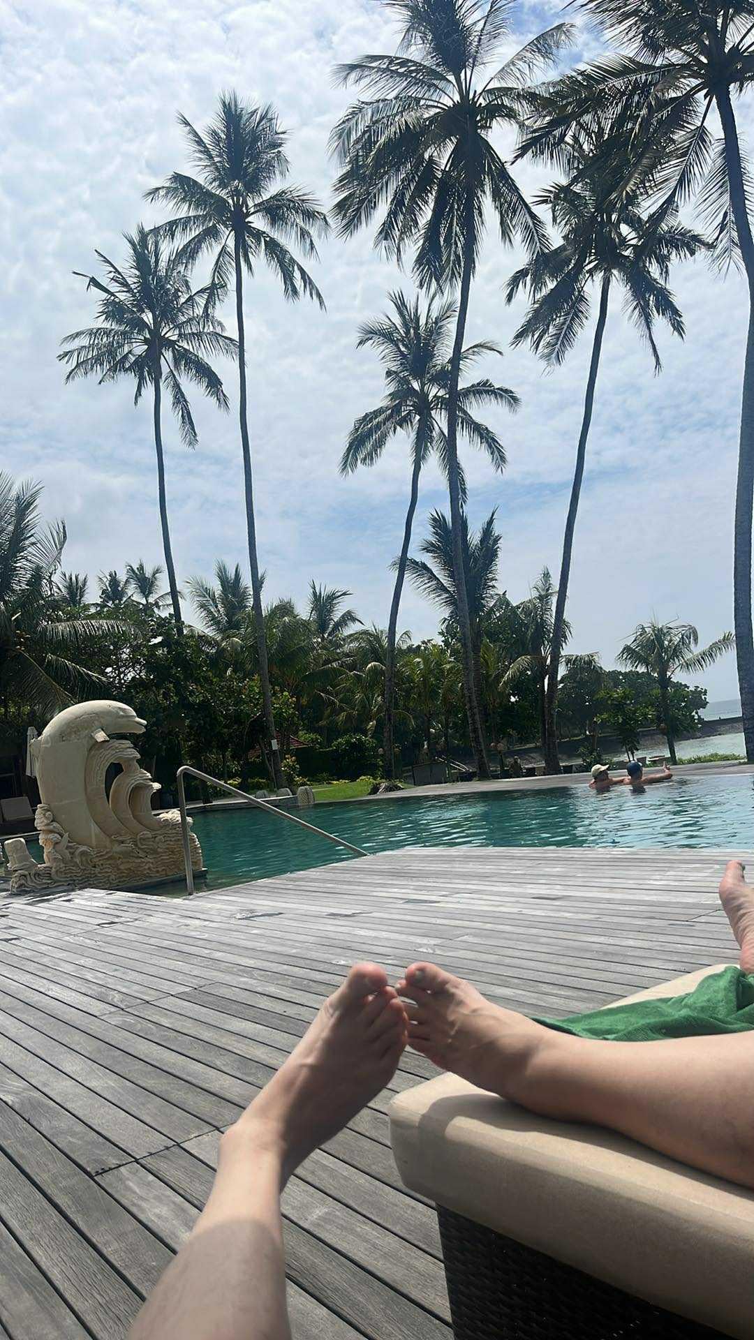 First morning by the pool, toes in paradise 