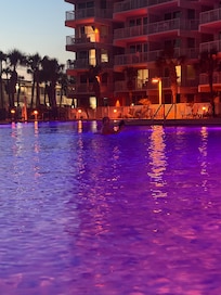 The pool is beautifully lit at night with changing colored bulbs!