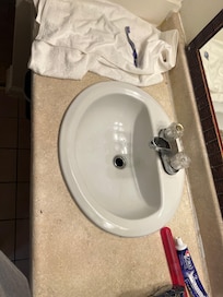 not black granite like online photos, so musty, crusty, and dusty. utensils shoved down the drain.