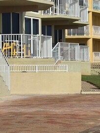 Sitting at the pool looking at our balcony.