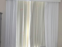 Holes in curtain. The red marks are the holes in the curtain.