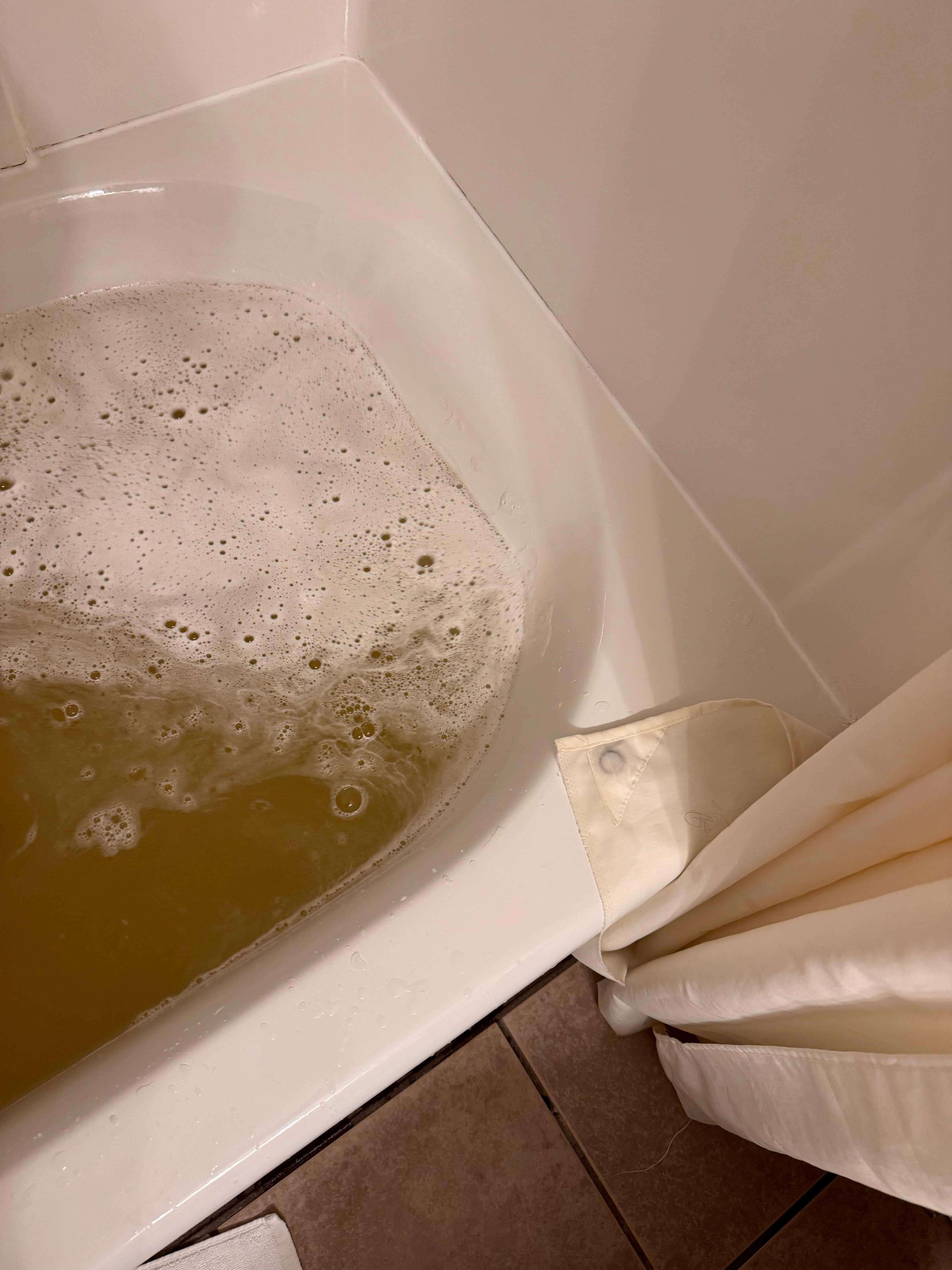 Brown tub water 