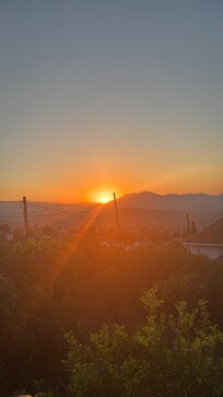Solnedgang fra huset.