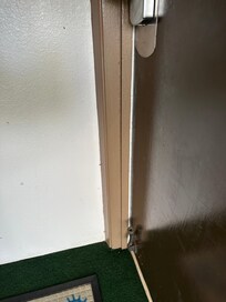 Front door does not close completely. Stronger draft coming through.