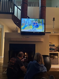 Making a fire while watching a movie