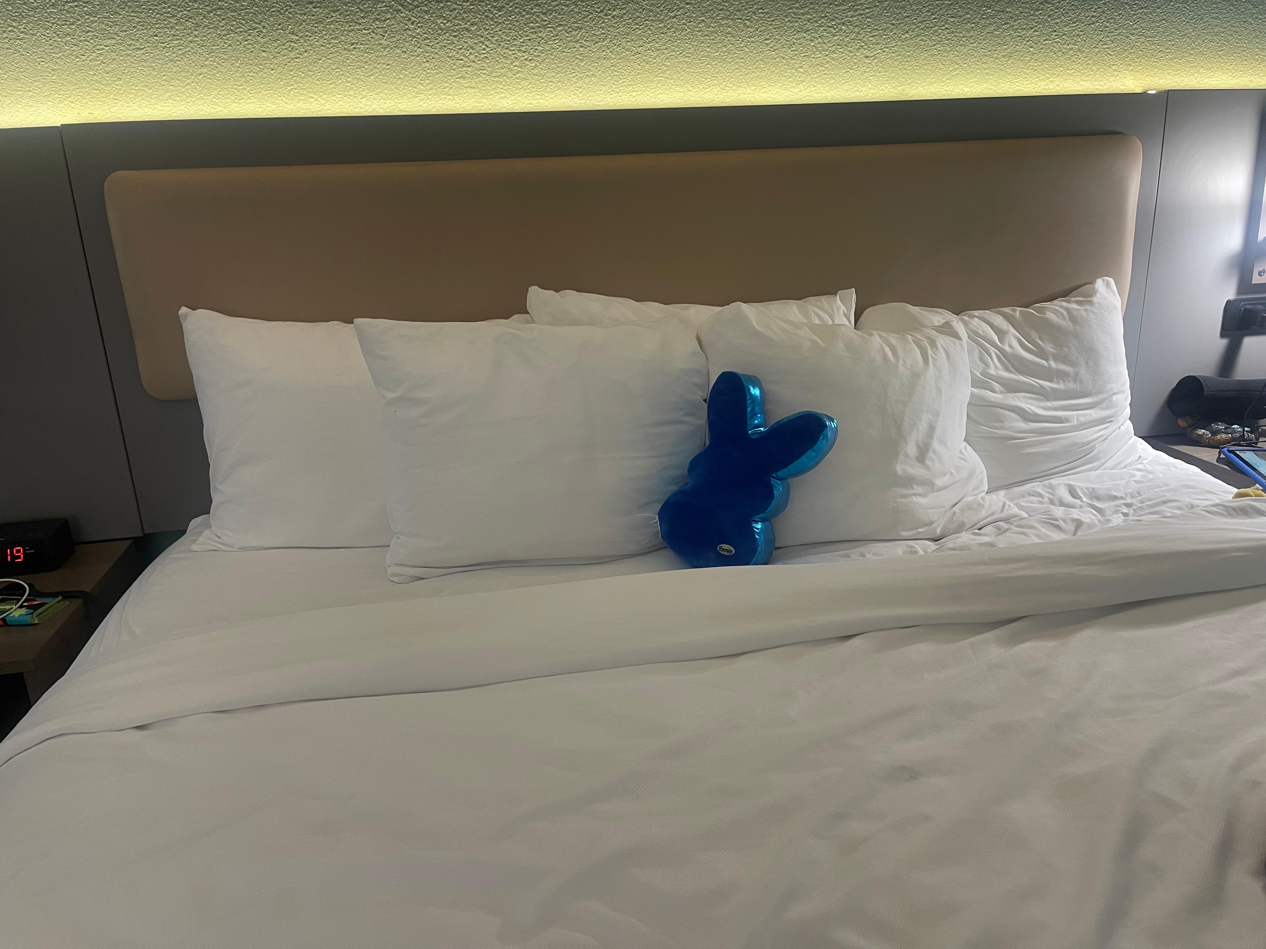 The house keeping staff always placed his stuffy neatly on the bed.
