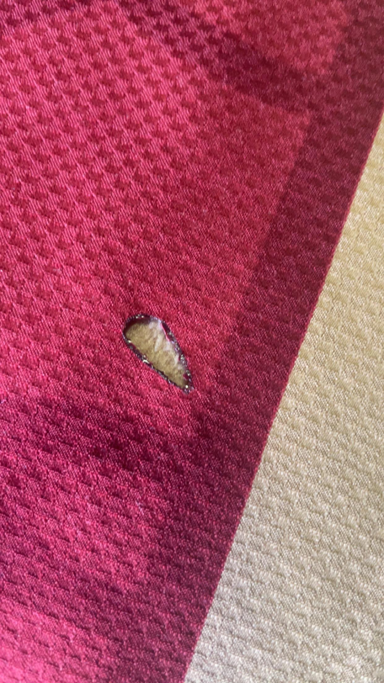 It had a burn hole in the bed