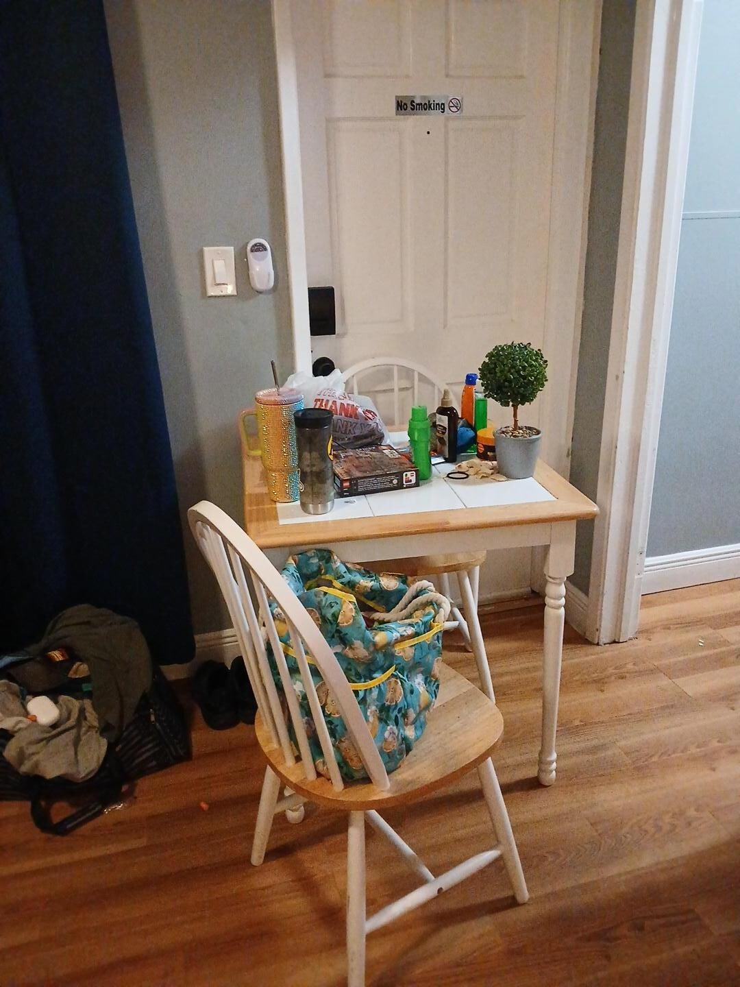 We put the table against the door for a tiny piece of mind because there was no deas bolt or latch