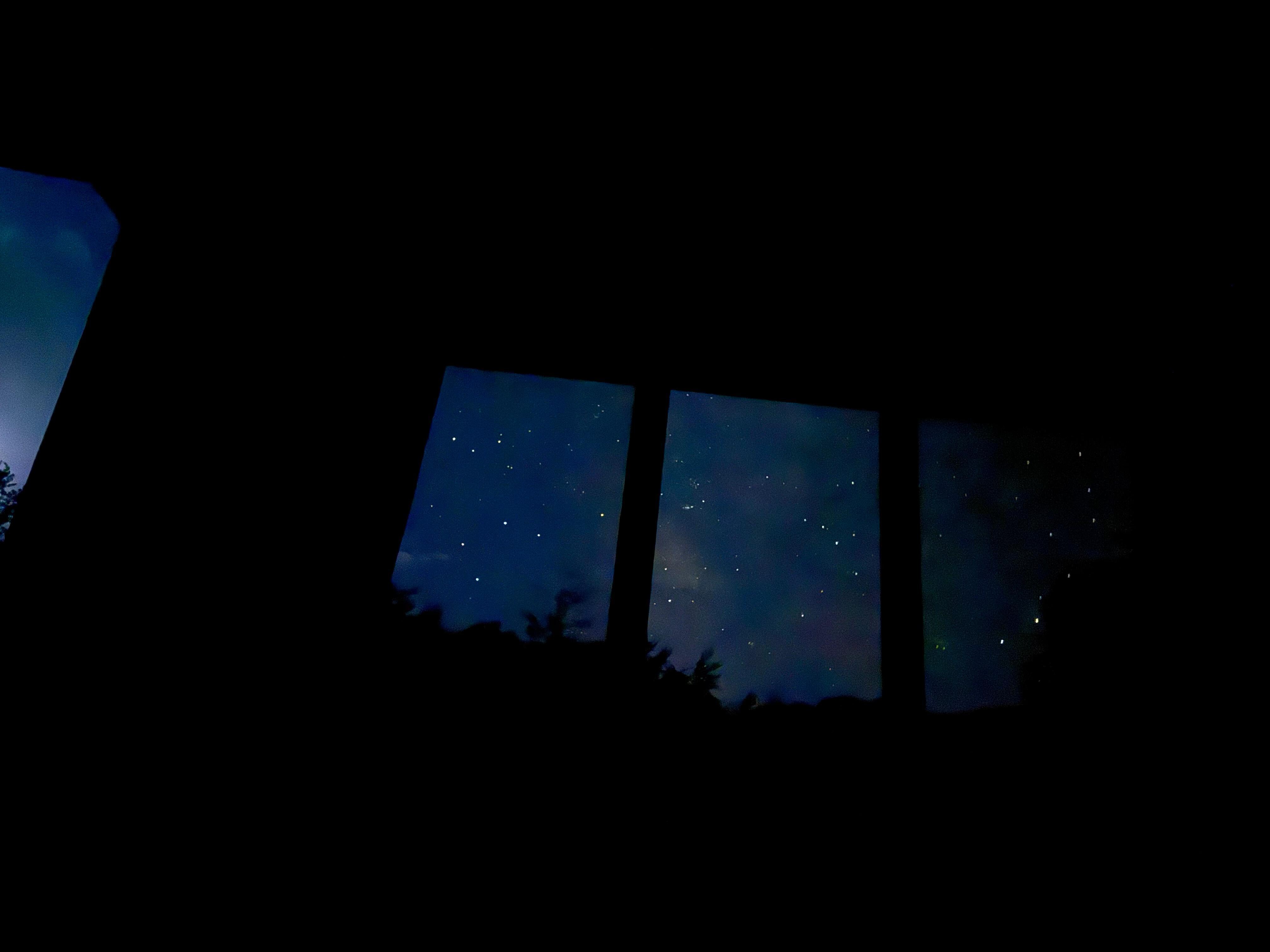View of night sky from bedroom