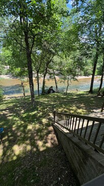 Caddo River standing on the back porch.