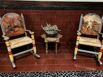 Elegant, traditional and very comfy rocking chairs in the open patio of the main hotel
