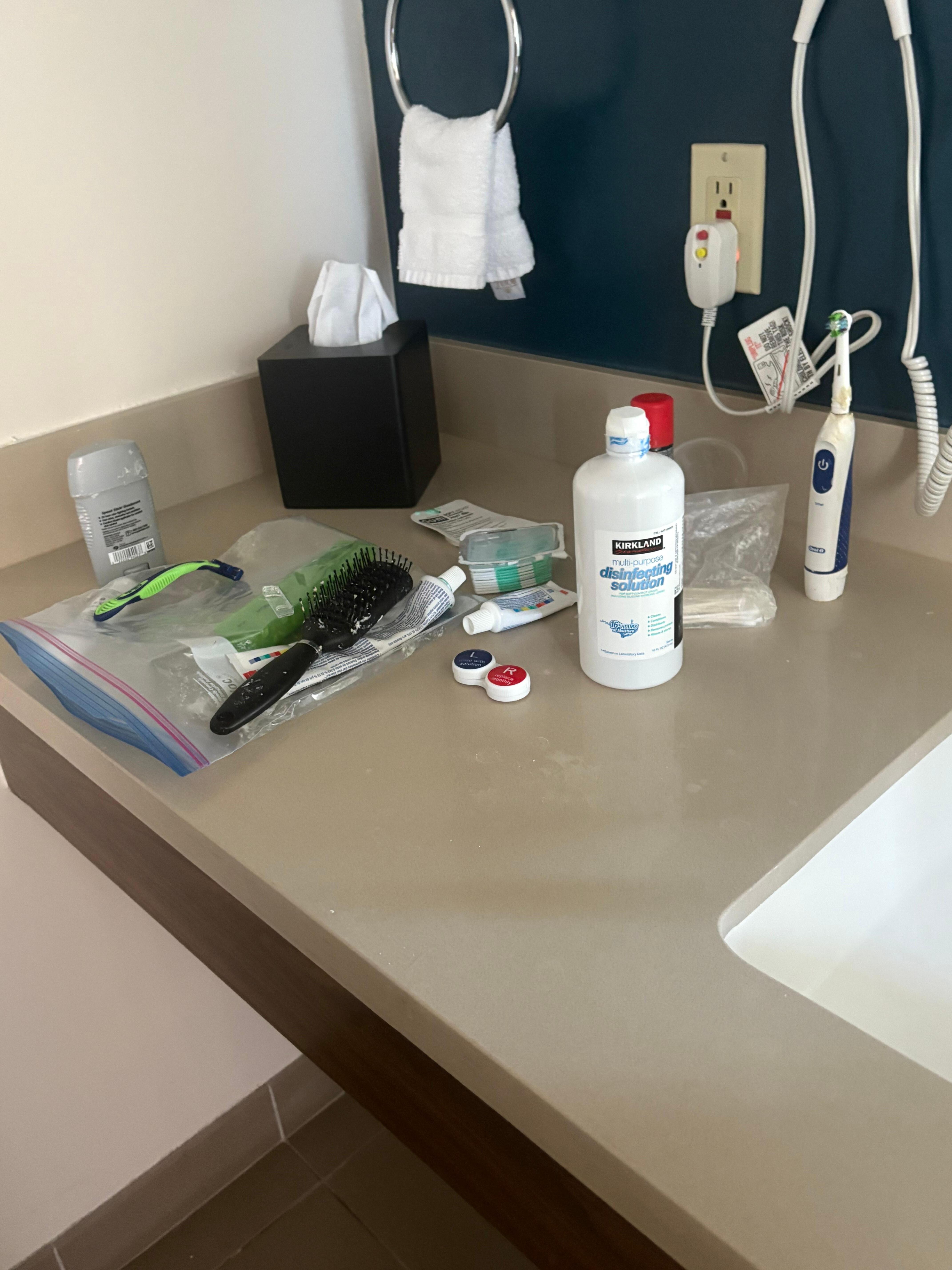 Toiletries not lined up neatly.