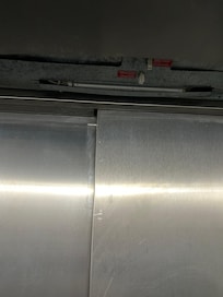 Elevator with missing upper panel