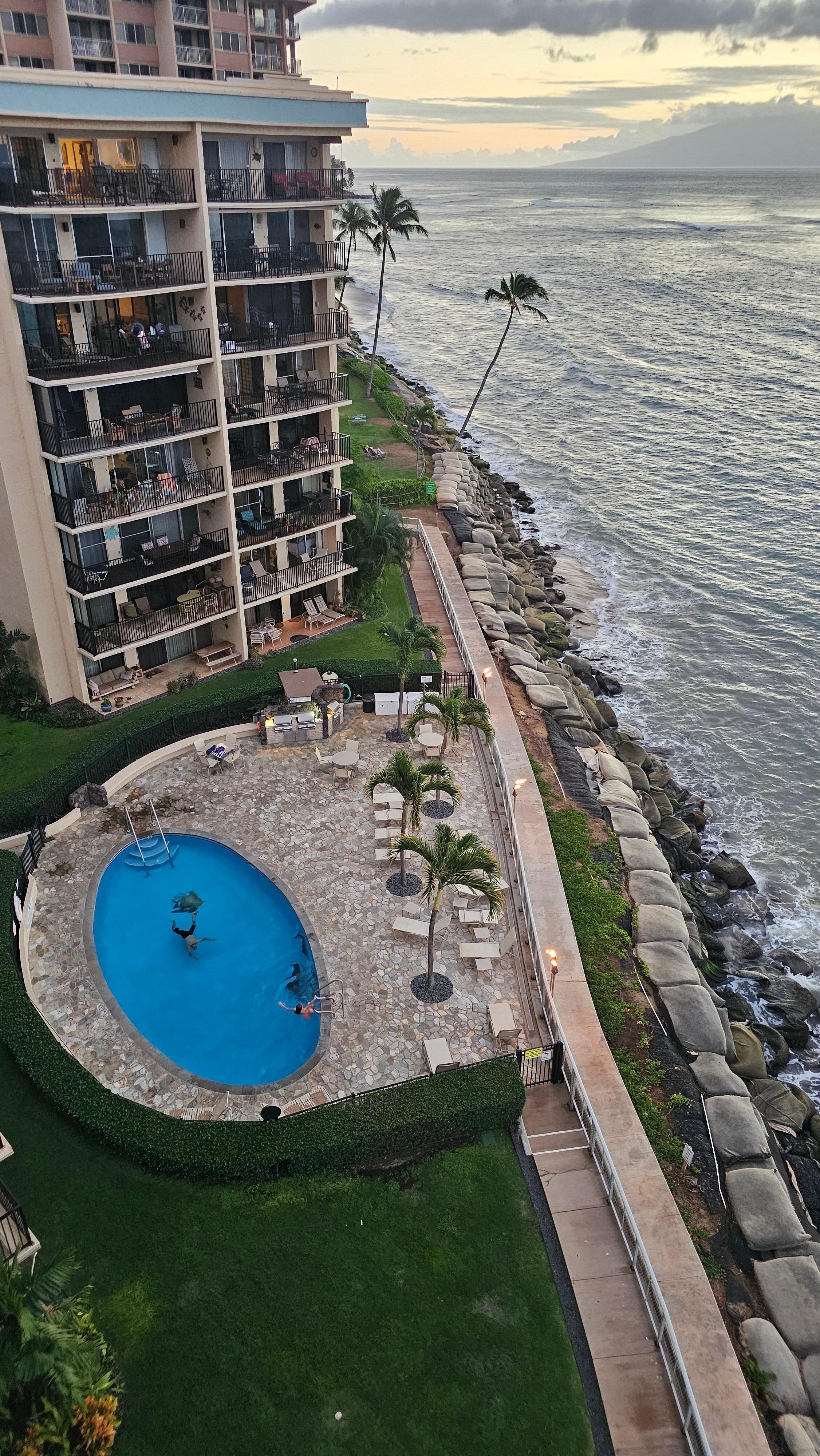 View of the pool and BBQ grills from the room