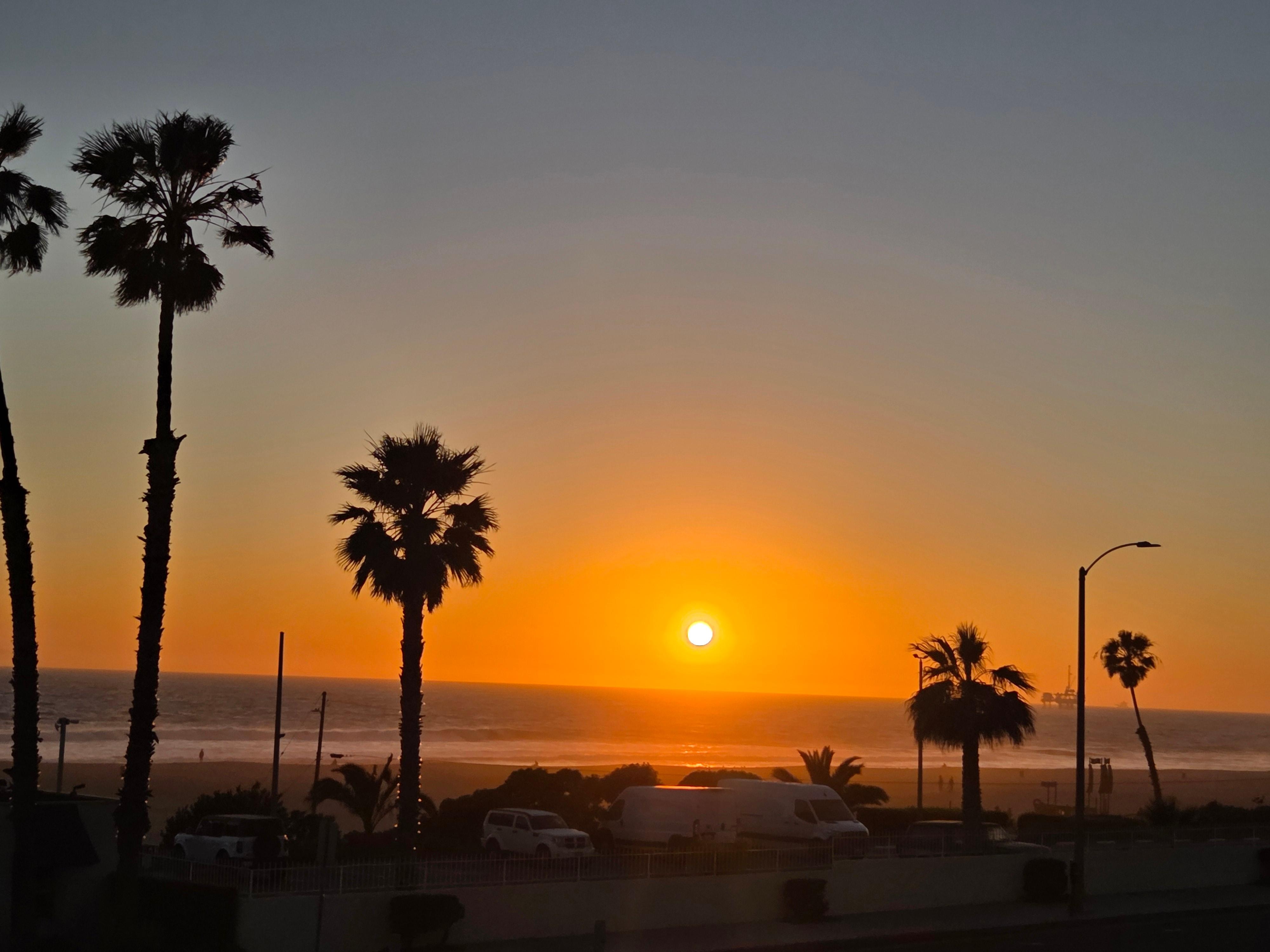 Picture taken of the beach from elevated patio seating area at the hotel. 