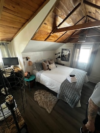 One of the Upstairs bedroom with great ceiling detail.