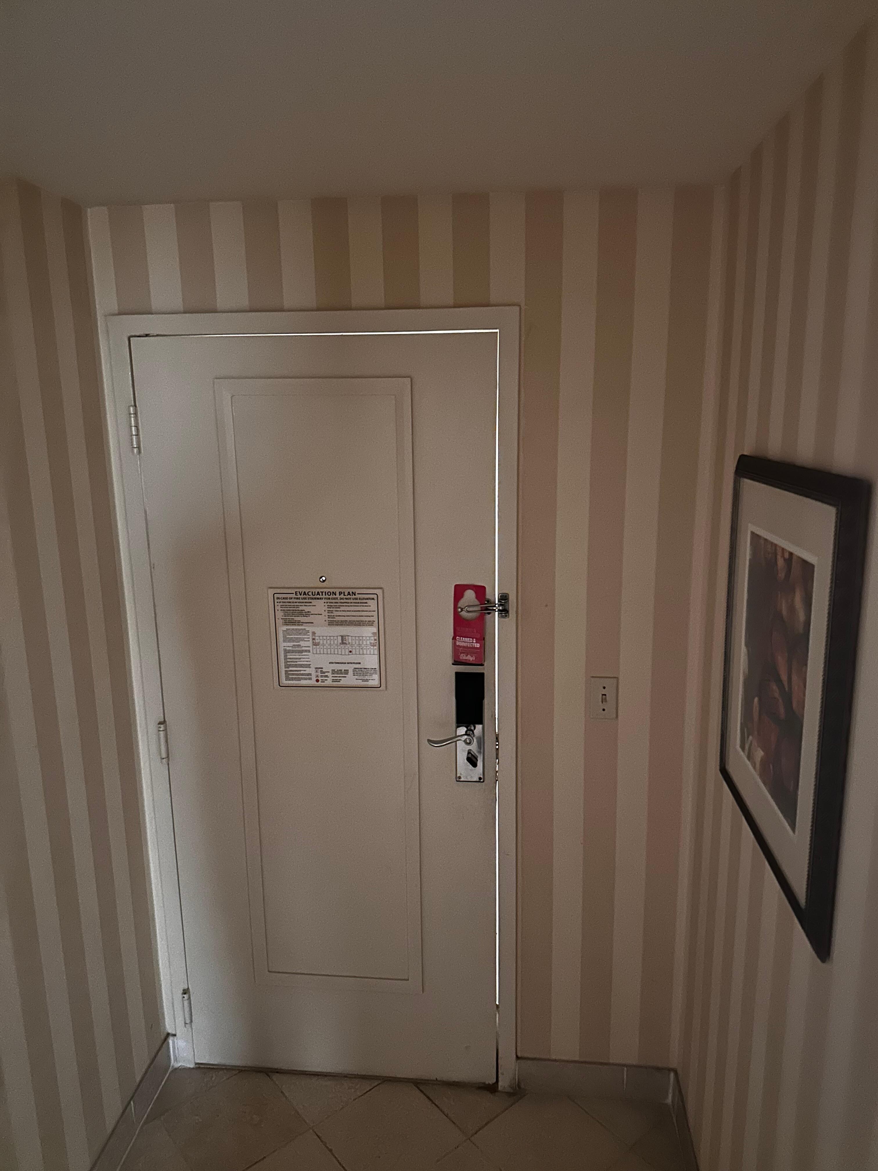 Door closed. Locked and still let noise and light in. 