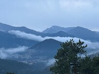 Longs Peak covered in clouds from the deck